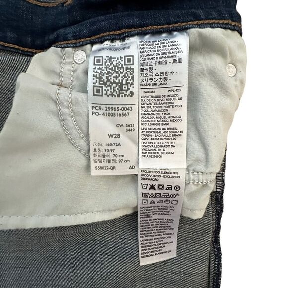 Levi’s ~ Women’s Mid Length Denim Shorts ~ size 28 ~ 5 pocket ~ rolled hem - Picture 8 of 9